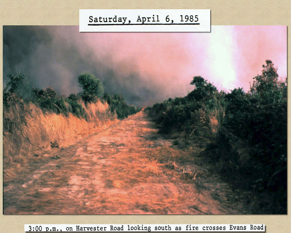 April 6, 1985  3:00 pm: Photo of fire crossing Evans Road at 3:00pm view from Harvester Road